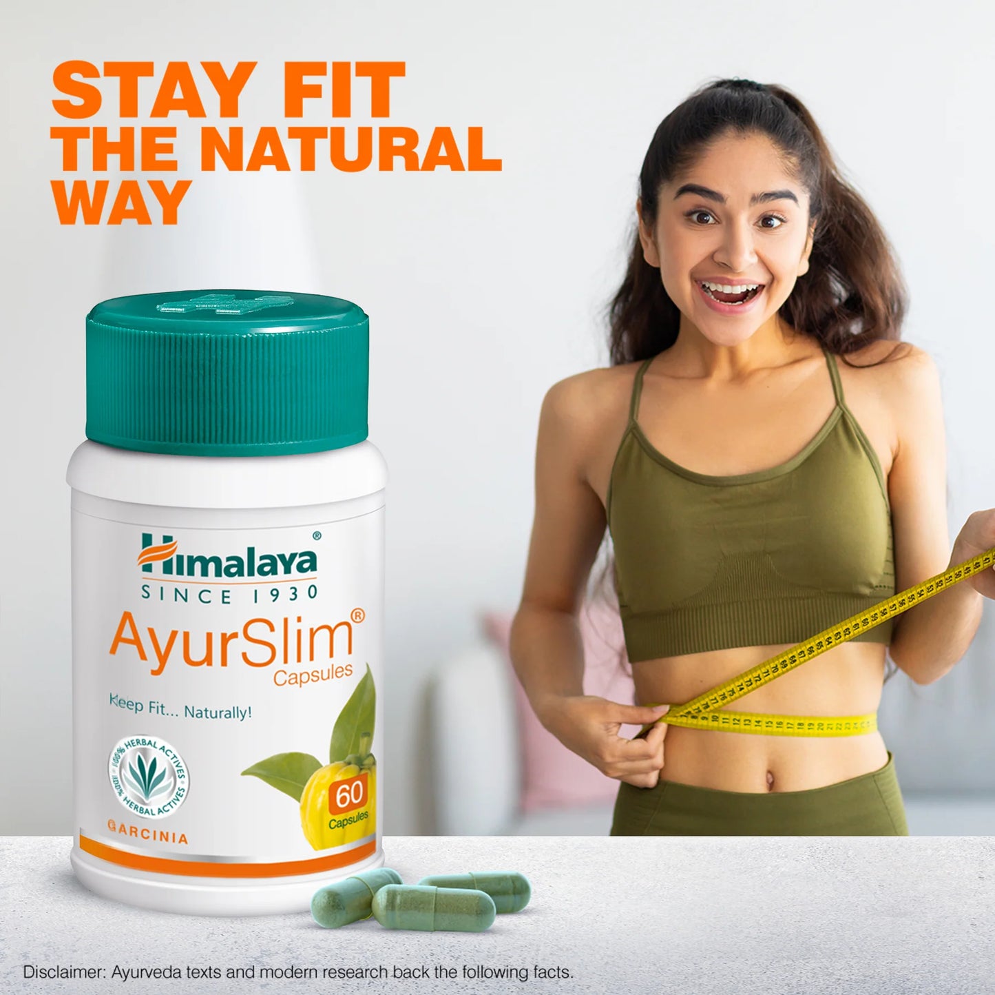 Himalaya AyurSlim capsules with a woman measuring her waist, text 'Stay Fit The Natural Way'.
