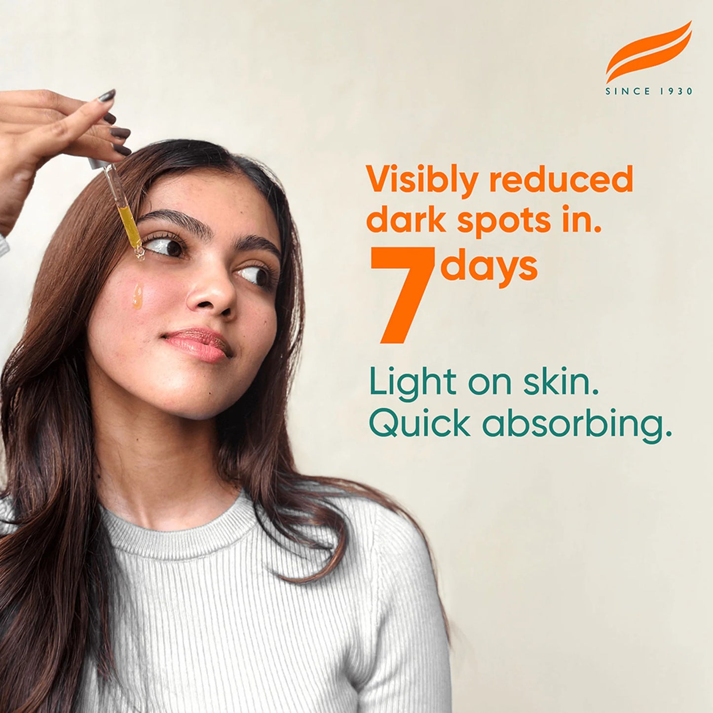 Woman applying a skincare product with text about dark spot reduction and product features.