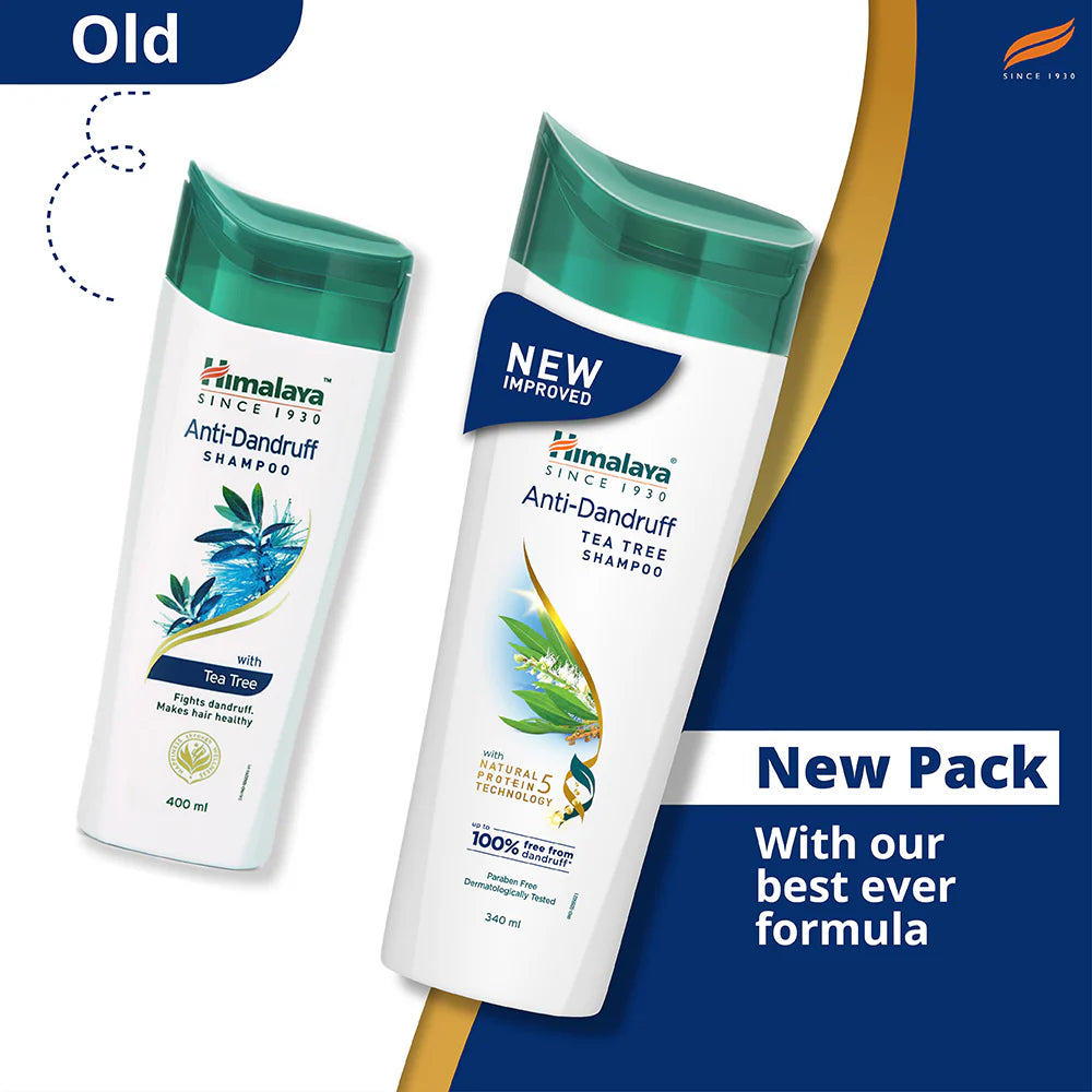 Himalaya Anti-Dandruff Shampoo bottles, one old and one new, on a blue background.