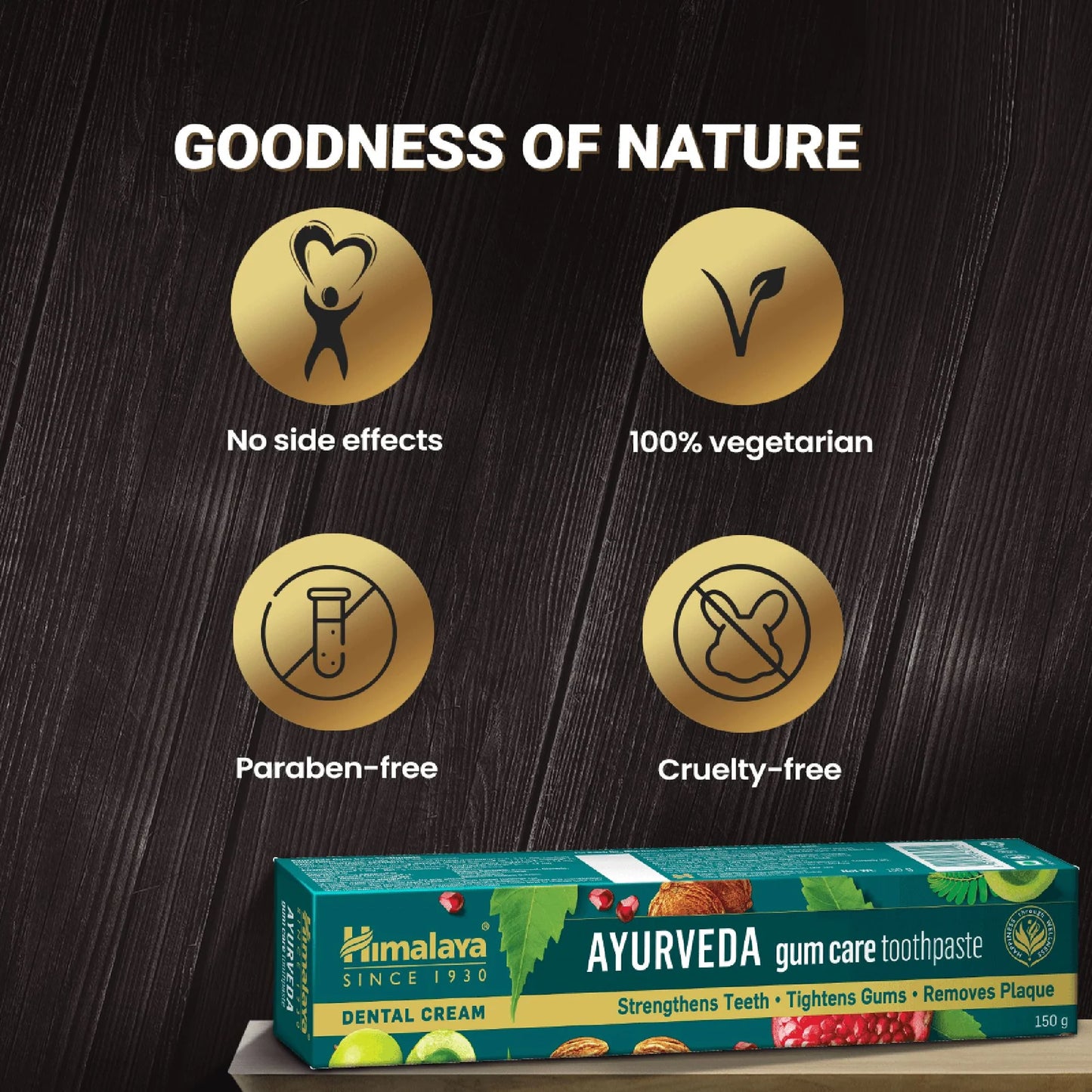 Himalaya Ayurveda gum care toothpaste packaging with 'Goodness of Nature' attributes on a dark wooden background.