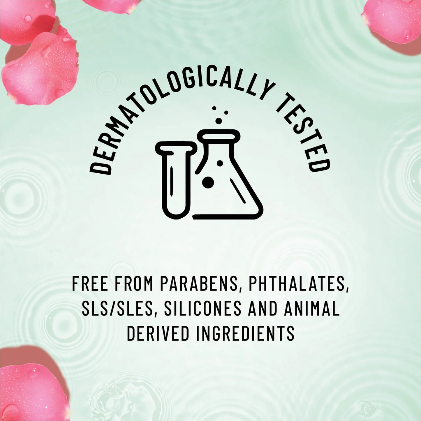 Dermatologically tested product label with test tubes and rose petals on a light green background