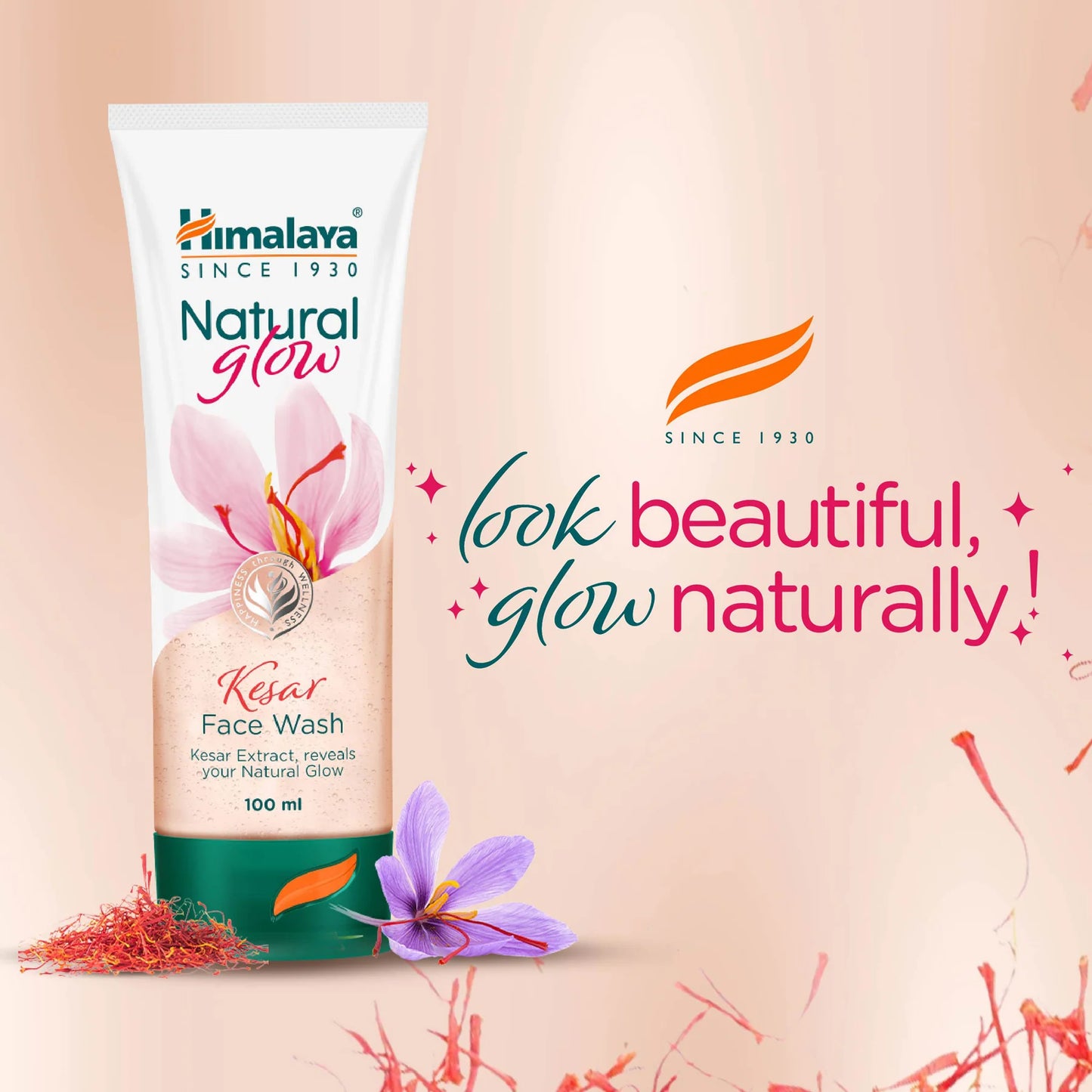 Himalaya Herbals Kesar Face Wash tube with floral elements on a beige background