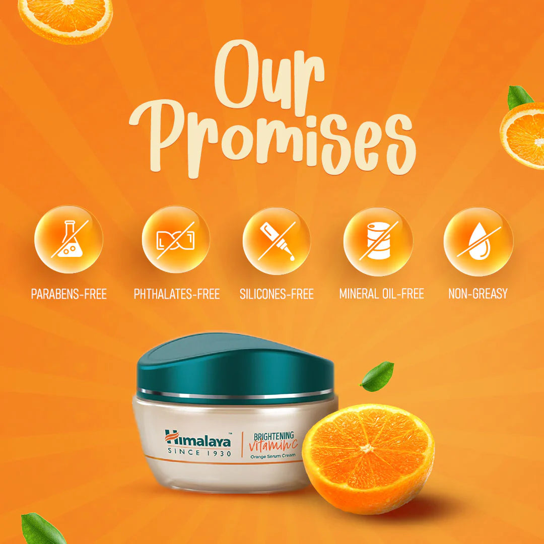 Himalaya skincare product with orange slices on an orange background, highlighting 'Parabens-Free', 'Phthalates-Free', 'Silicones-Free', 'Mineral Oil-Free', and 'Non-Greasy' features.