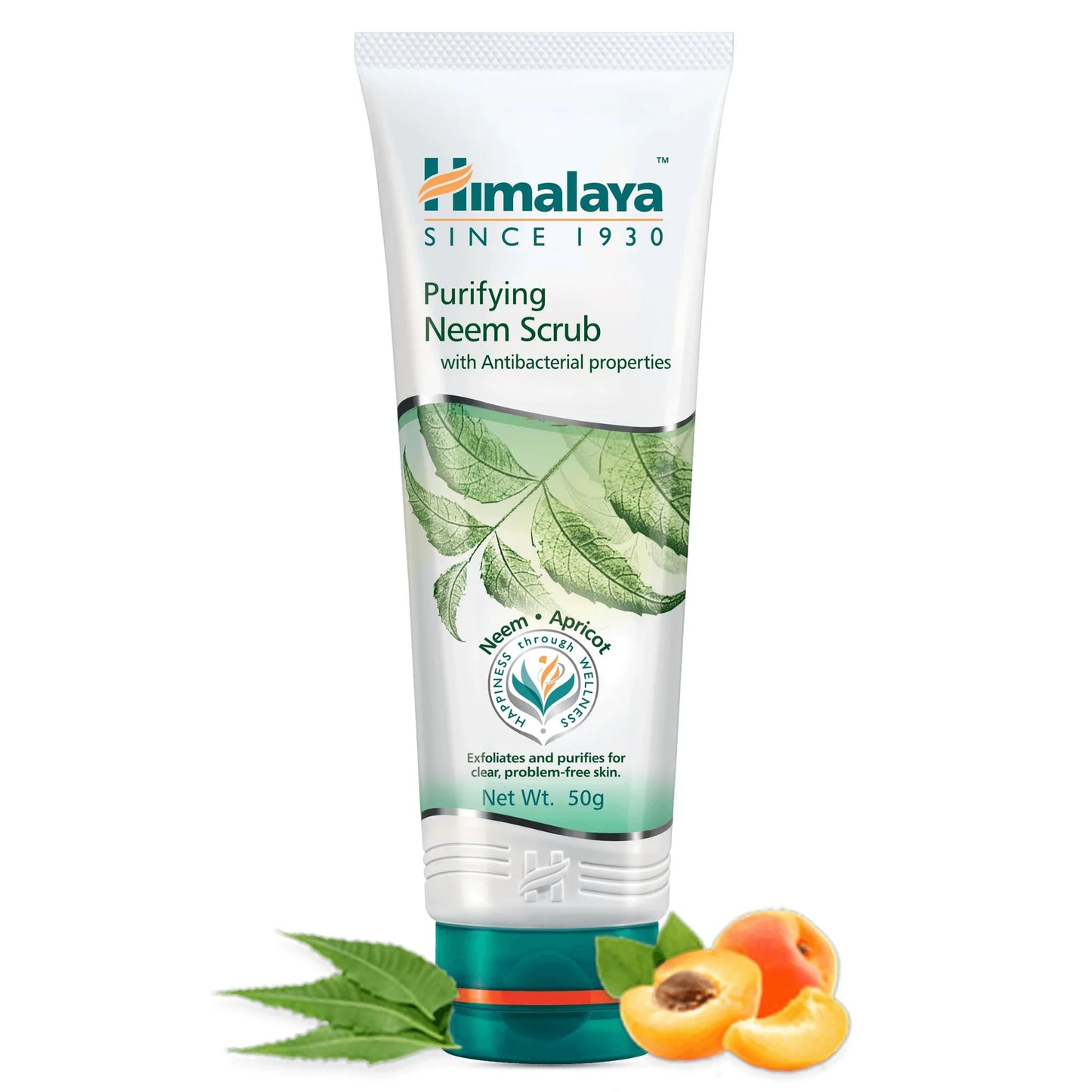Himalaya Purifying Neem Scrub tube with neem leaves and apricots on a white background